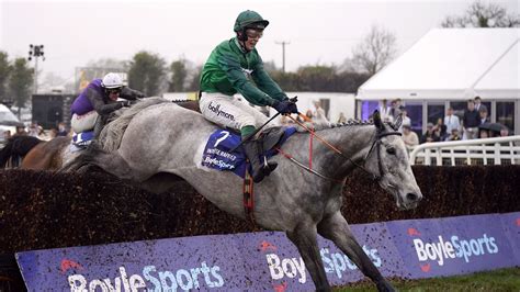 Intense Raffles storms to Irish Grand National glory .